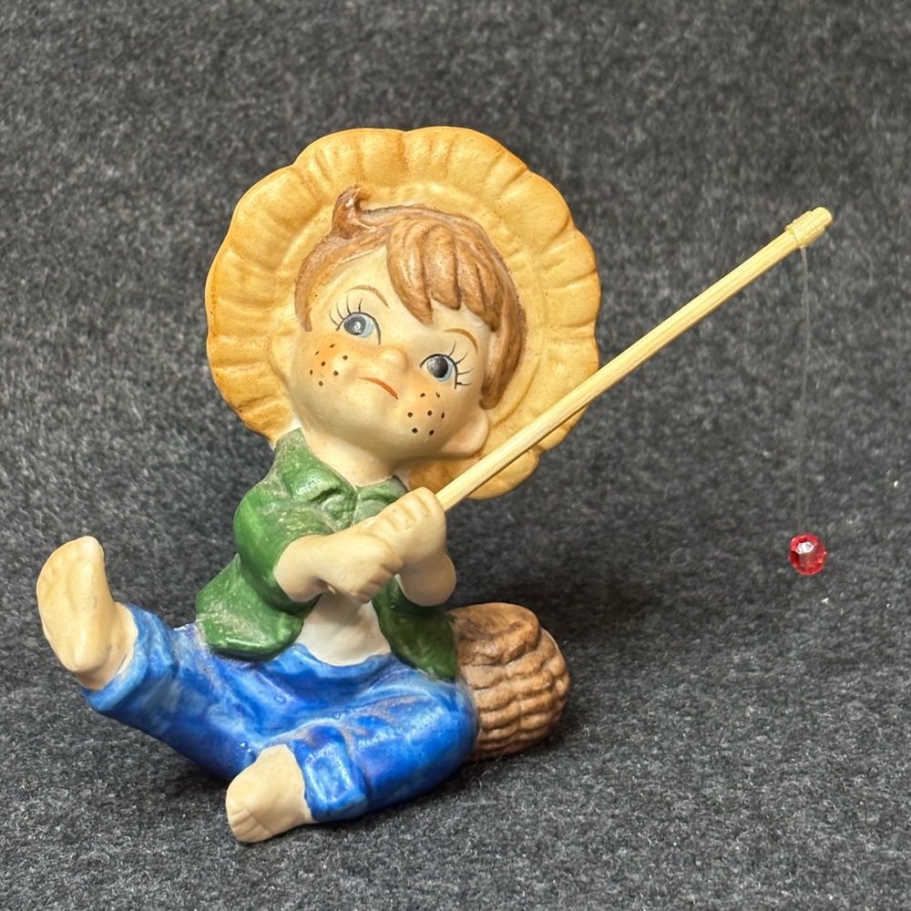 Vintage Playful Fishing Boy Figurine in Brown, Green and Blue Colors